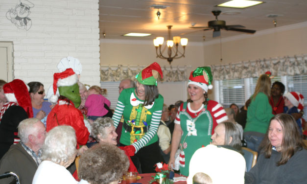 Elves Spread Cheer As Downtown Hosts Sip, Snack, Shop Event in 2018