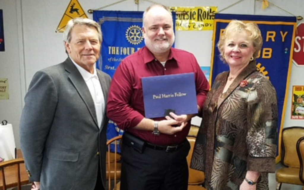 Rotarians present Paul Harris Fellow Award to Ron Hunt