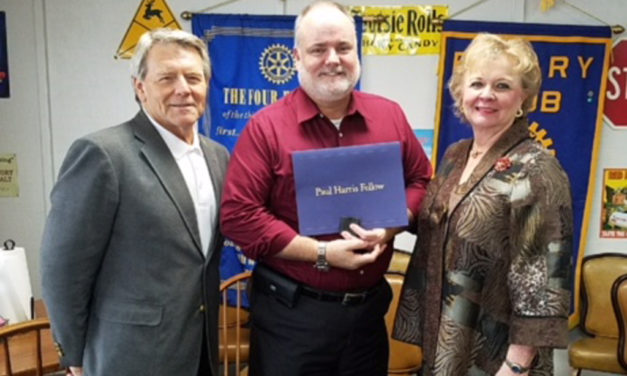 Rotarians present Paul Harris Fellow Award to Ron Hunt