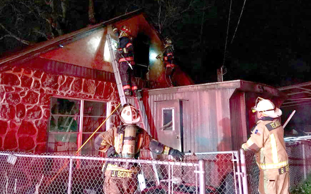 Firefighters Battle Blaze in New Year’s Eve House Fire