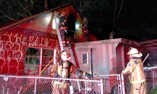 Firefighters Battle Blaze in New Year’s Eve House Fire