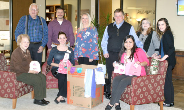 Bank Employees Collect Items for Local Cancer Patients