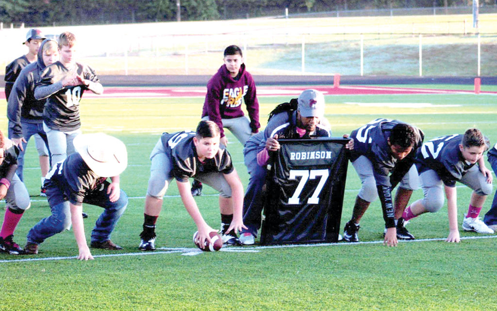 Youth Football Association Retires Jersey of Former Teammate