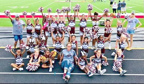 Cheerleaders Bring Home the Trophy