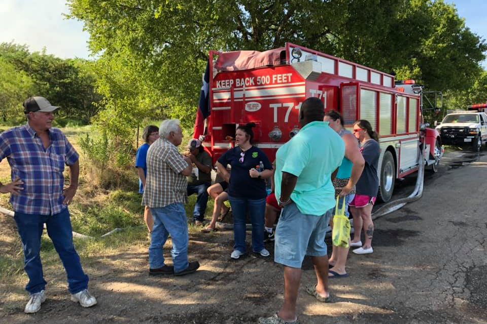 Communities, Fire Departments Join To Battle Grass Fire