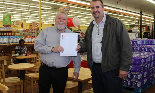 Manager Marks Forty Years at Grocer