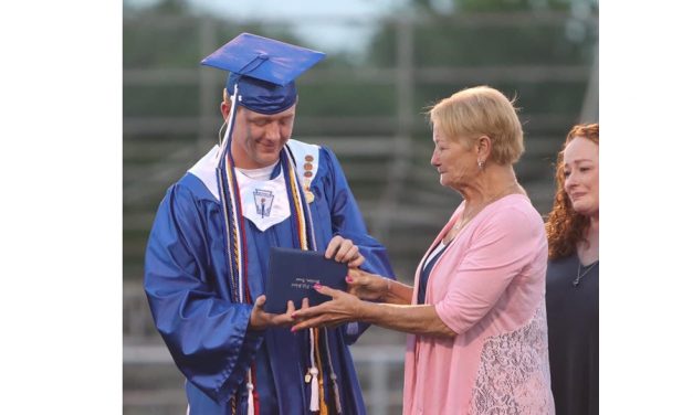 Taking The Field With Family at Wortham Graduation