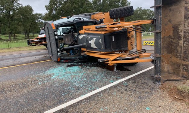 Highway Blocked by Overturned City Equipment