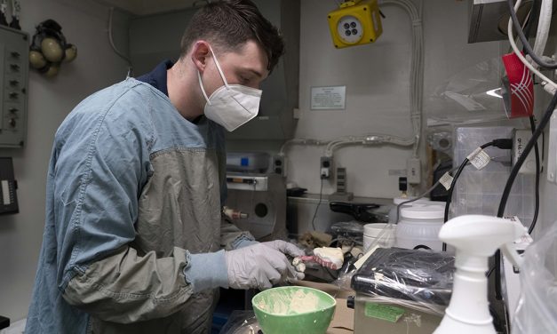 Wortham Sailor Works Aboard Ship
