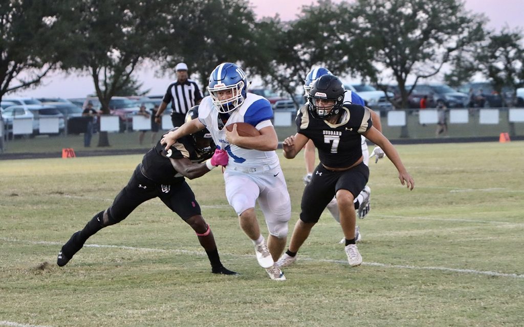 Bulldogs Dominate Jaguars in District Opener 52-12