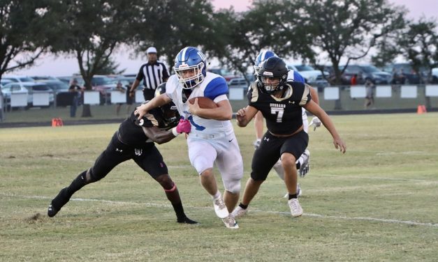 Bulldogs Dominate Jaguars in District Opener 52-12