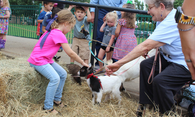 Kids Feed Goats at Story Time