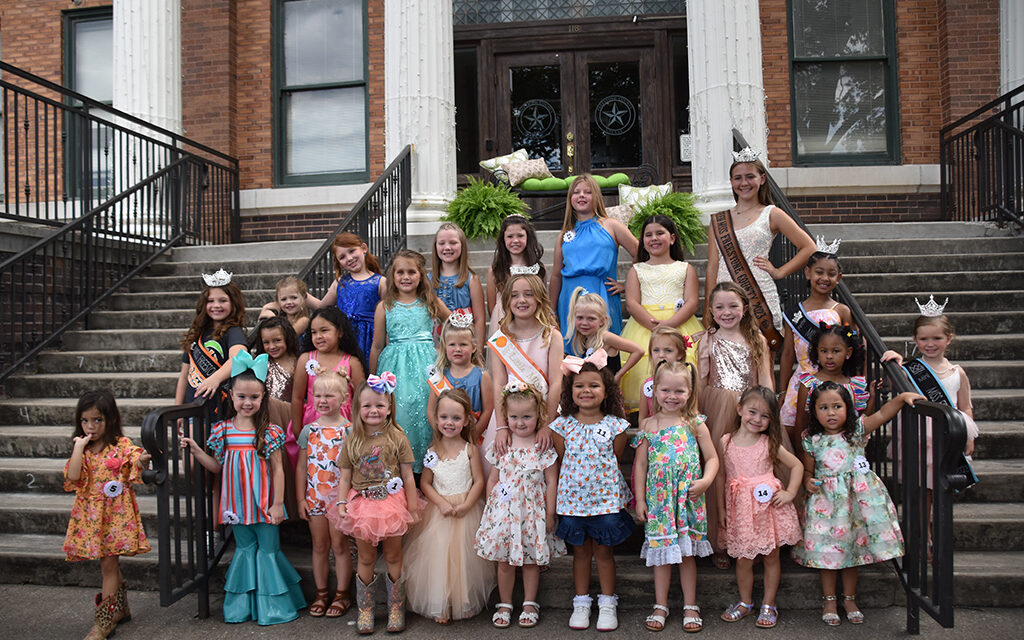 Twenty-five Young Ladies Walk the Sidewalk to Compete for Little Miss Peach 2023