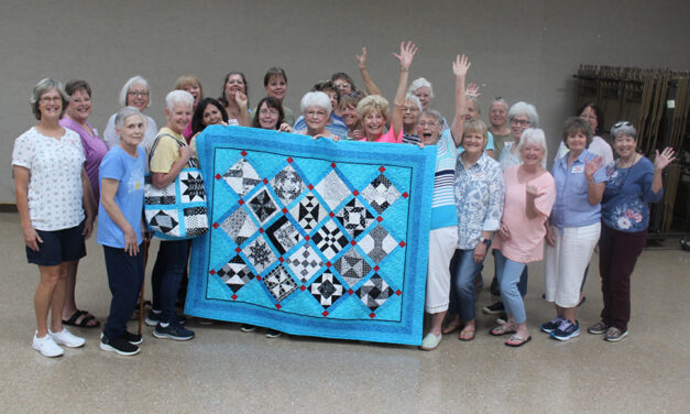 Freestone Quilt Guild Donates Quilt to Charity