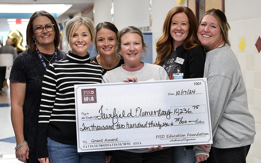 Fairfield Teachers Accept BIG Checks from Fairfield ISD Education Foundation