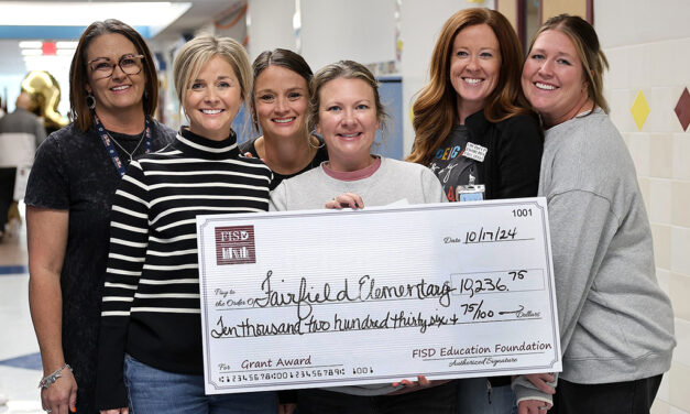 Fairfield Teachers Accept BIG Checks from Fairfield ISD Education Foundation