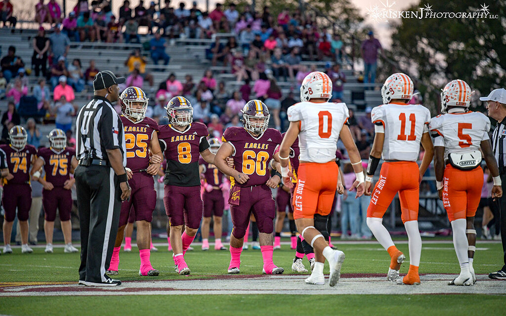 Eagles Hold Off Lions for district opening win 50-43