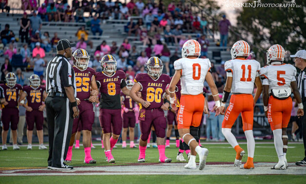 Eagles Hold Off Lions for district opening win 50-43